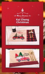 Close-up of Christmas placemat featuring buffalo plaid car and gnome with cutlery pocket