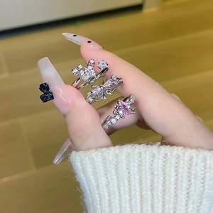 Three-piece silver star and heart ring set with pink stones and sparkling zircons