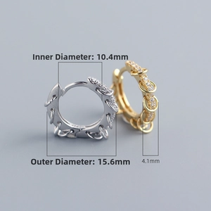 Detail of S925 silver hoop earrings with clear dimensions and sparkling zircon inlays