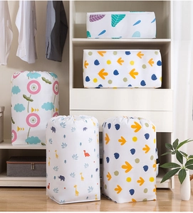 Detail view of colorful PEVA storage bags with floral patterns in a home closet
