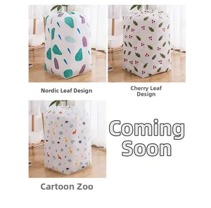 Waterproof drawstring storage bag detail showing leaf and cartoon patterns on wood floor