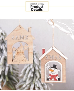 Detail view of hollow wooden XMAS ornaments featuring Santa and Snowman with twine cord
