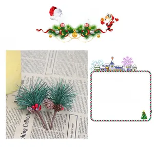 Detailed view of artificial pine needles with mini pinecones and red holly berries