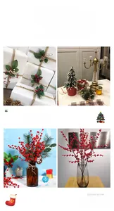 Detailed Christmas scene decor featuring pine needles, red berries and dried pine cones