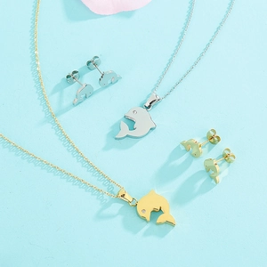Fashionable dolphin jewelry set with necklaces and earrings in gold and silver finish