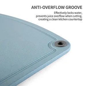 Wheat straw cutting board with anti-overflow groove and hanging hole for kitchen use