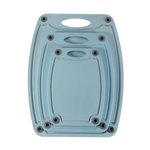 3-piece wheat straw cutting board set in blue with non-slip corners and handle holes