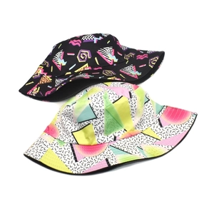 Fashionable bucket hat with vintage geometric patterns and colorful graffiti prints