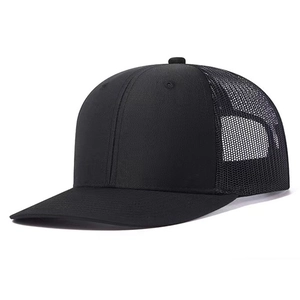 Detail view of the black breathable mesh back and cotton fabric on the trucker cap