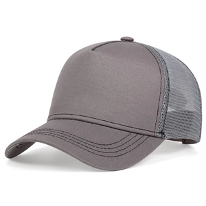 Close-up of dark grey trucker hat showing breathable mesh back and seamless five-panel crown