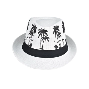 Close-up of white straw fedora with black coconut tree patterns and a decorative ribbon