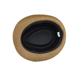 Close-up of the internal 100% paper straw texture and black sweatband of the sun hat
