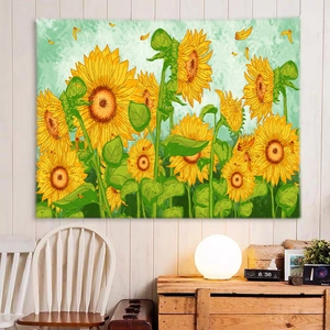 Detailed view of sunflower landscape tapestry hanging on a white wooden wall in a cozy room
