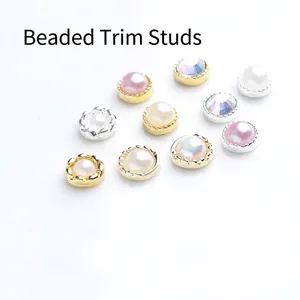 Mix of alloy nail art charms with pearls and rhinestones in gold and silver metal base