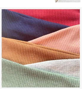 Detailed macro view showing six colors of ribbed knitted headbands for sport and fashion