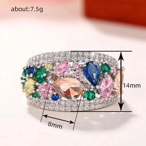 Chunky silver rainbow teardrop ring featuring colorful pear-cut gems and pave stones