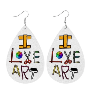 Detail of teardrop leather earrings featuring 'I LOVE ART' text and artistic tool patterns