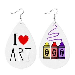 Close-up of leather teardrop earrings featuring I Love Art text and colorful crayons