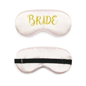 Pink silk satin Team Bride sleeping eye mask with adjustable strap and gold embroidery