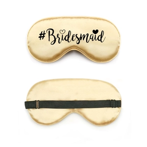 Golden silk sleeping eye mask with #Bridesmaid lettering and adjustable strap