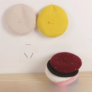 Detailed close-up of wool pearl berets for girls in seven elegant various colors