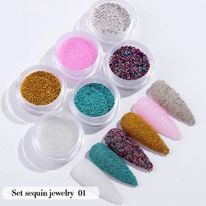 Macro detail of six-color nail caviar beads in jars for 3D manicure decoration