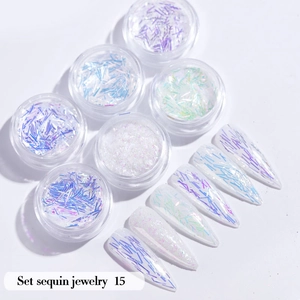 Detailed view of aurora needle nail sequins in 6 jars with iridescent manicure effect