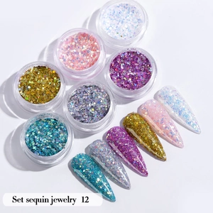 Detailed view of 6-color glitter nail sequins set with heart and butterfly shapes