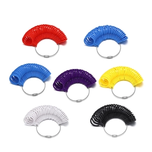 Multiple colorful plastic ring sizers in a matrix layout on white background