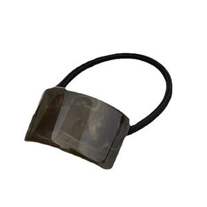Maillard style hair tie with amber resin rectangle charm on black elastic band