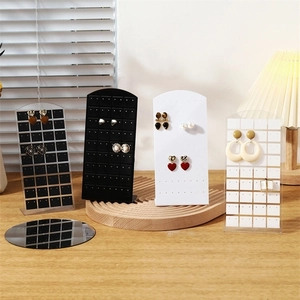 L-shaped acrylic 72-hole earring display stand shown in black, white and clear finishes