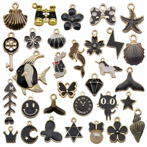 Assorted black and gold alloy cartoon pendants with various shapes for DIY jewelry making
