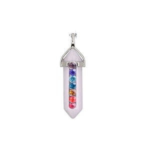 Detail of a hexagonal rose quartz chakra pendant with seven colorful faceted crystals