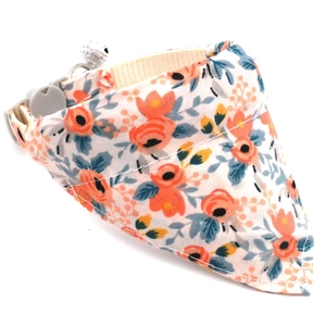 Floral pet bandana collar with orange daisy pattern and adjustable buckle for cats and dogs