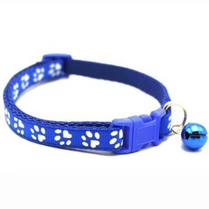 Blue nylon pet collar with white paw prints featuring a bell and adjustable buckle