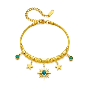 Gold plated stainless steel bracelet with blue turquoise sun and star charms