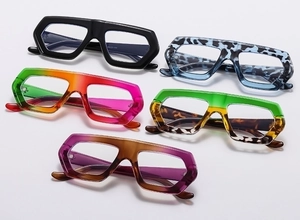Detailed view of bold geometric eyewear frames in five gradient and patterned finishes