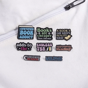 Set of 8 colorful enamel book pins for bags and clothes with creative reading slogans