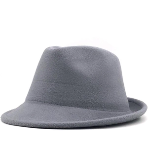 Detailed top view of a classic grey felt fedora hat with a pinched crown design