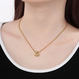 18K gold plated stainless steel necklace with twisted hexagonal ring pendant and diamond accents
