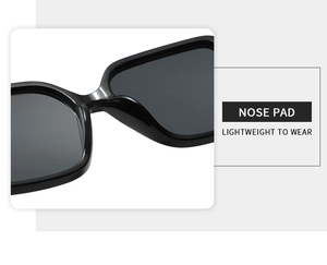 Macro detail of integrated nose pads on oversized square sunglasses for lightweight comfort