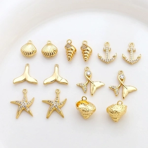 14k gold plated marine pendants set featuring shell whale tail and anchor designs