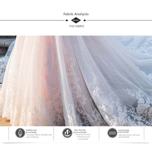 Detail of soft breathable white lace and champagne mesh fabric for a bridal gown