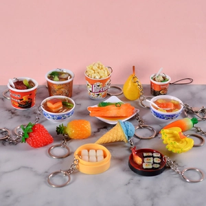 Variety of realistic PVC food keychain miniatures including noodles and fruit toys