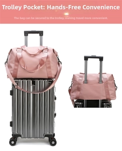Pink waterproof travel bag showing the luggage trolley sleeve for hands-free travel use