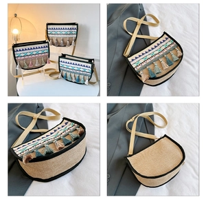 Detail of ethnic crossbody bag featuring jute texture, colorful embroidery and hanging tassels