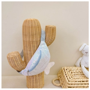 Detail of mermaid sequin fanny pack with fishtail accent on a decorative cactus hanger