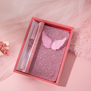 Pink sequin notebook with 3D angel wings and glitter liquid pen in a gift box