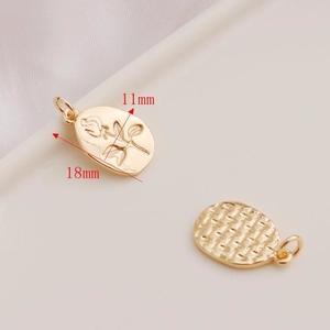 Detailed 18mm gold rose pendant showing floral engraving and textured back for DIY jewelry