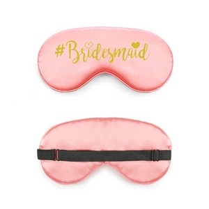 Front and back detail of pink silk bridesmaid eye mask with adjustable black strap